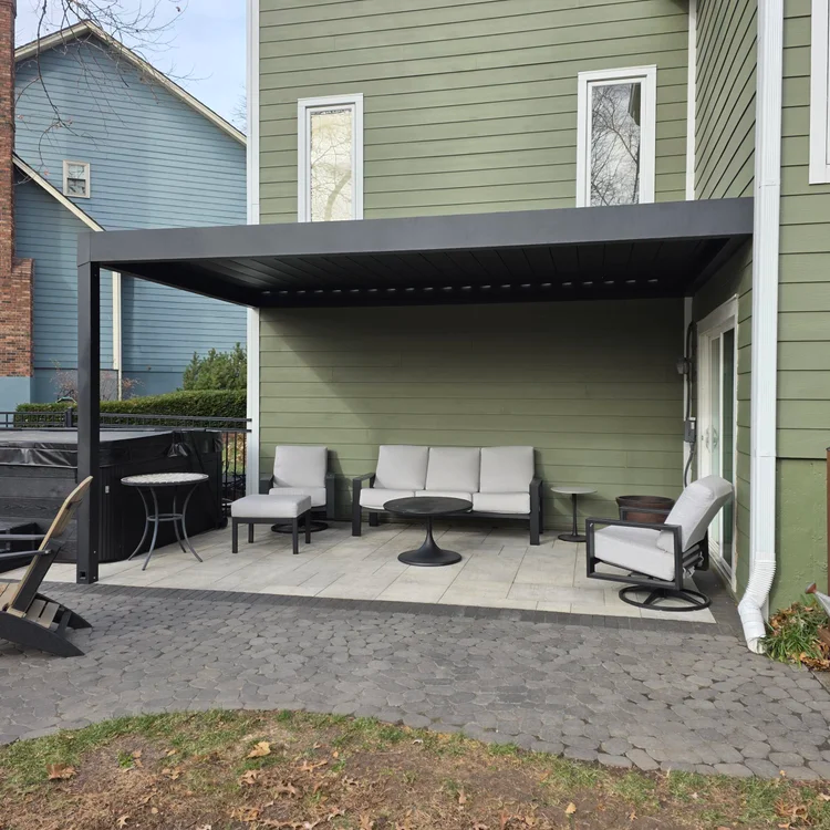 Louvered pergola with modern lounge seating